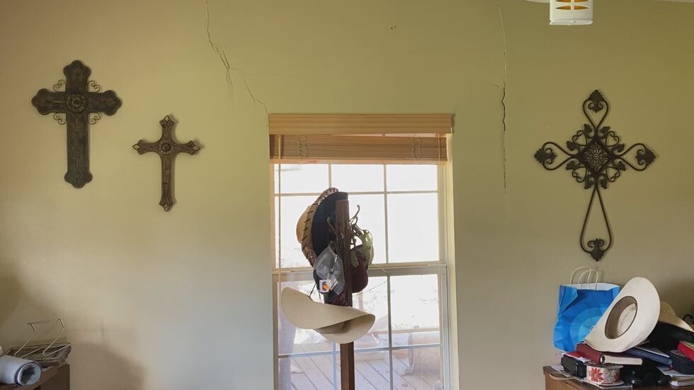Cracks can be seen in walls around the home. The floors have warped in some areas causing...