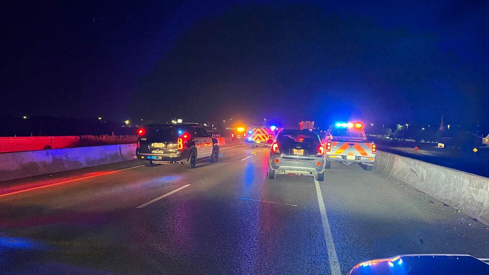 Part of Earl Rudder Freeway shut down while officers work crash.